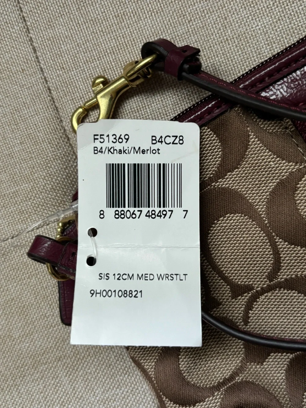 COACH Signature Canvas Wristlet in Khaki and Merlot